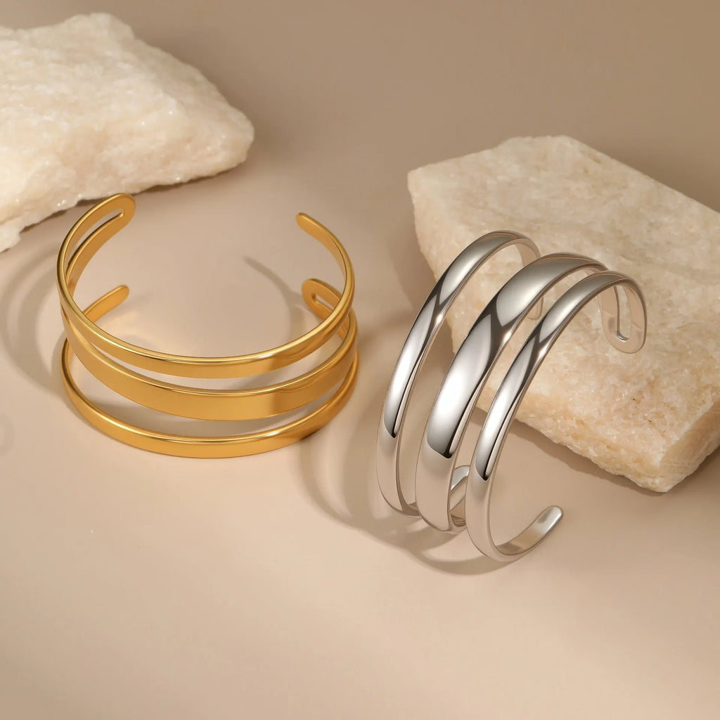 Women's stainless steel bracelet with geometric design and simple opening mechanism in gold electroplated finish