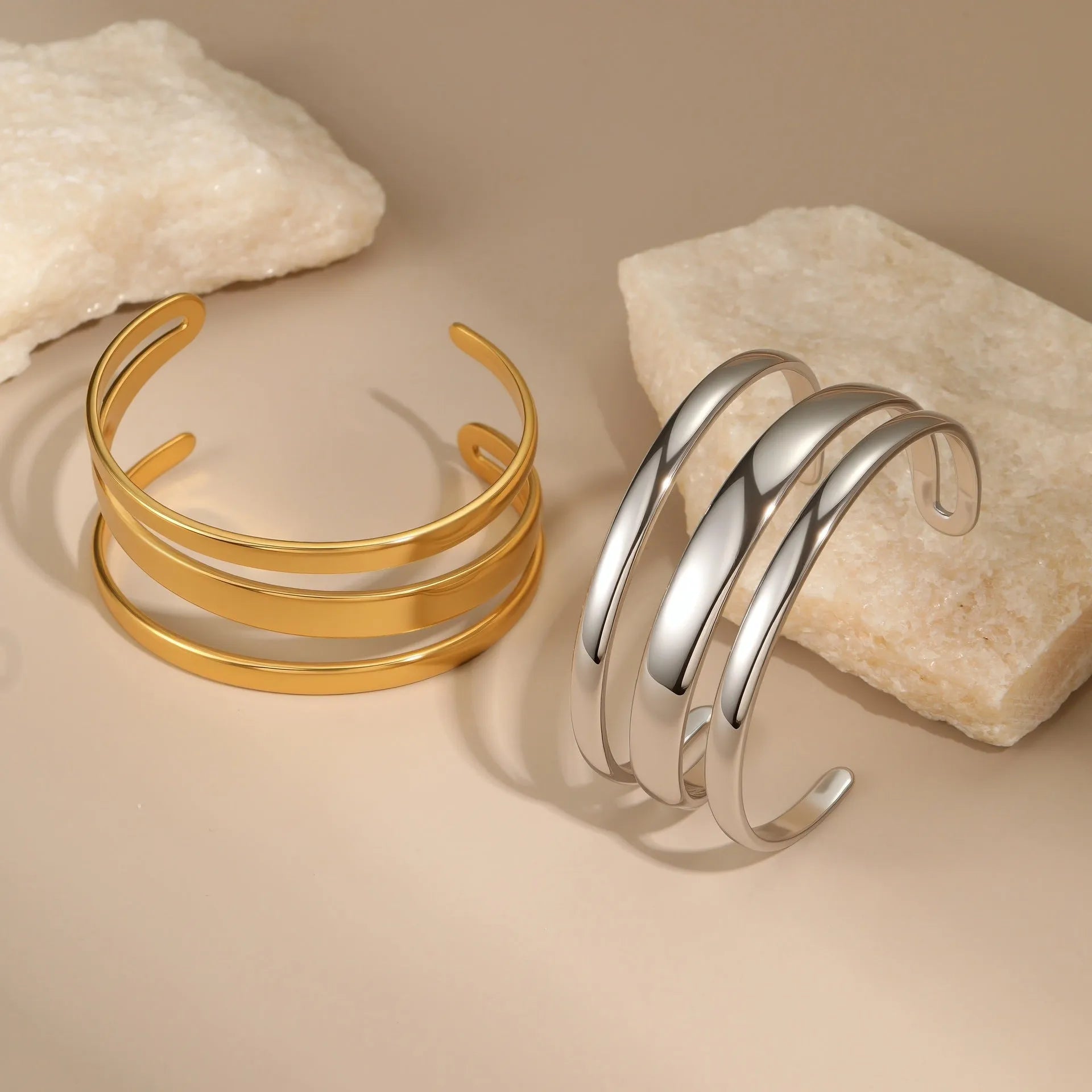 Women's stainless steel bracelet with geometric design and simple opening mechanism in gold electroplated finish