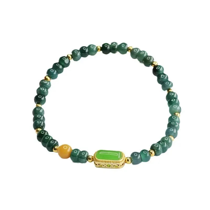Blue natural stone bracelet with abacus beads in geometry shapes including round, oval and ring elements
