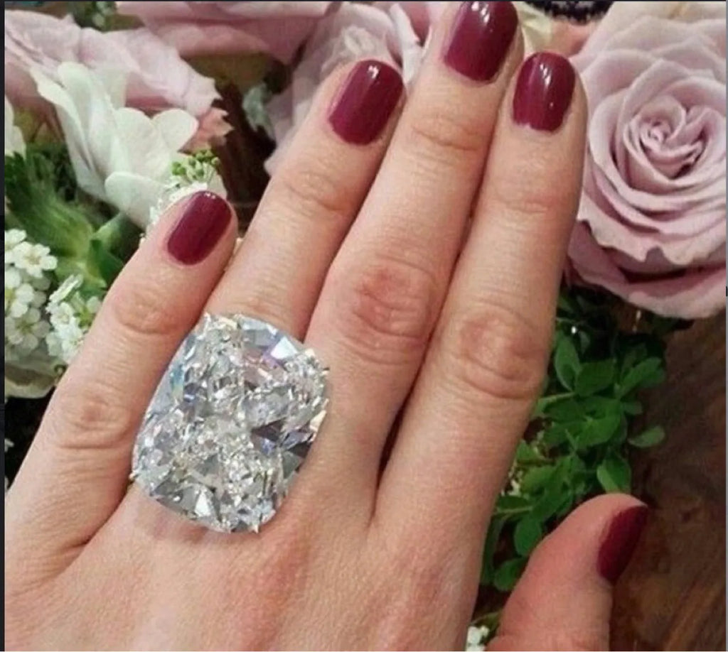 Simple geometric women's alloy ring with inlaid square detail in white gold colour plating.