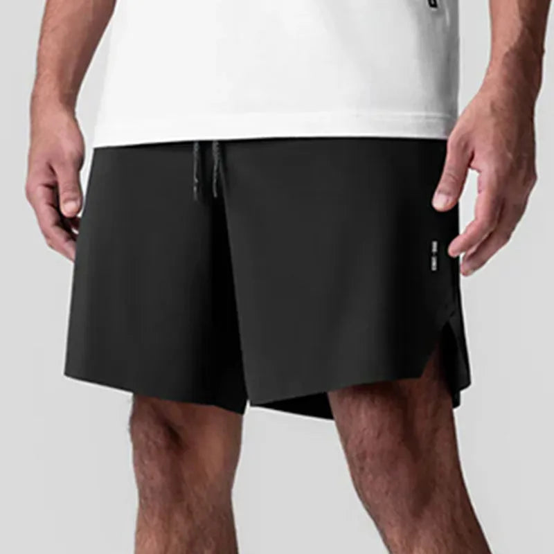 Men's grey seamless polyester sports shorts with elastic waist, shown front and back.
