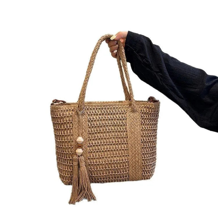 Women's straw crossbody shoulder bag in milky white colour with woven texture