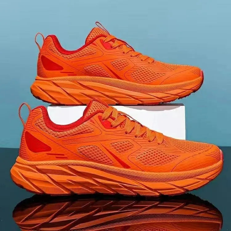 Pair of colourful mesh running shoes with round toe and plastic sole, shown in available colours.