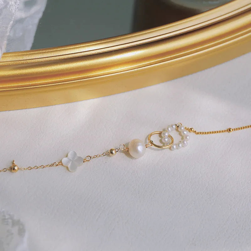 Natural pearl women's bracelet with 14k gold-plated accents in picture colour