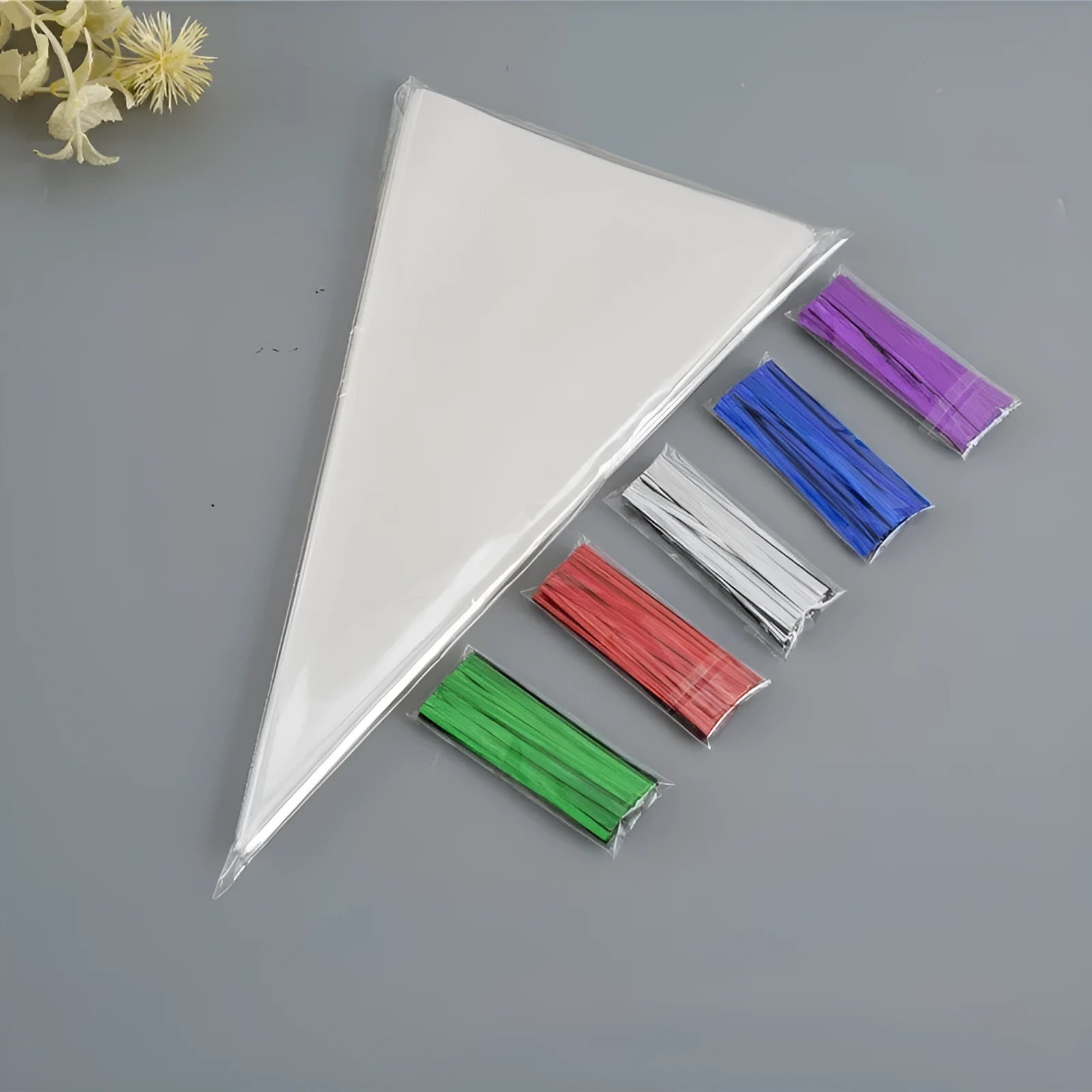 Triangle-shaped clear OPP plastic packaging bags with tie wire closures for holiday gifts