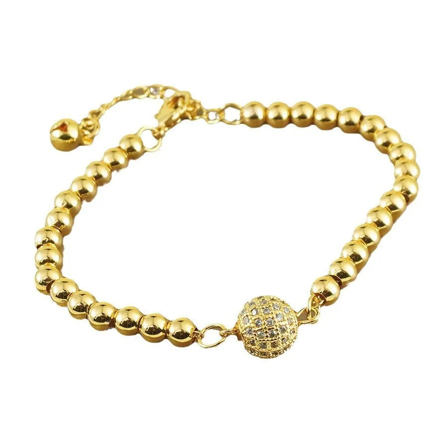 Women's copper bracelet with a heart-shaped design and a single ball zircon detail.