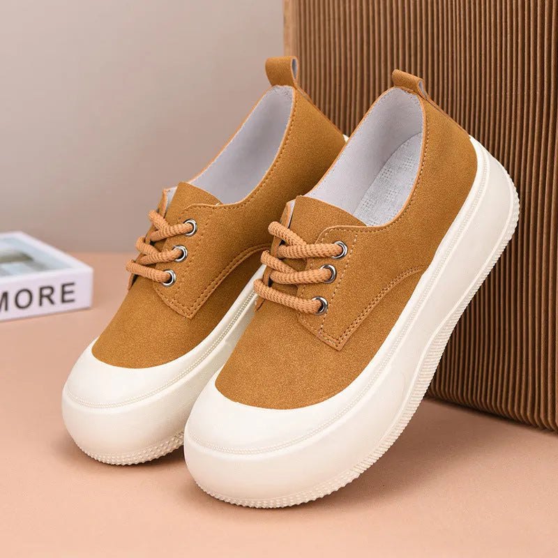 Women's camel suede platform loafers with a round toe, flat 4cm rubber sole, and front lace-up fastening.