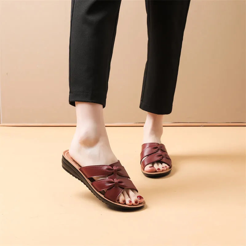 Women's cowhide slippers with soft bottom in red, black and beige colours
