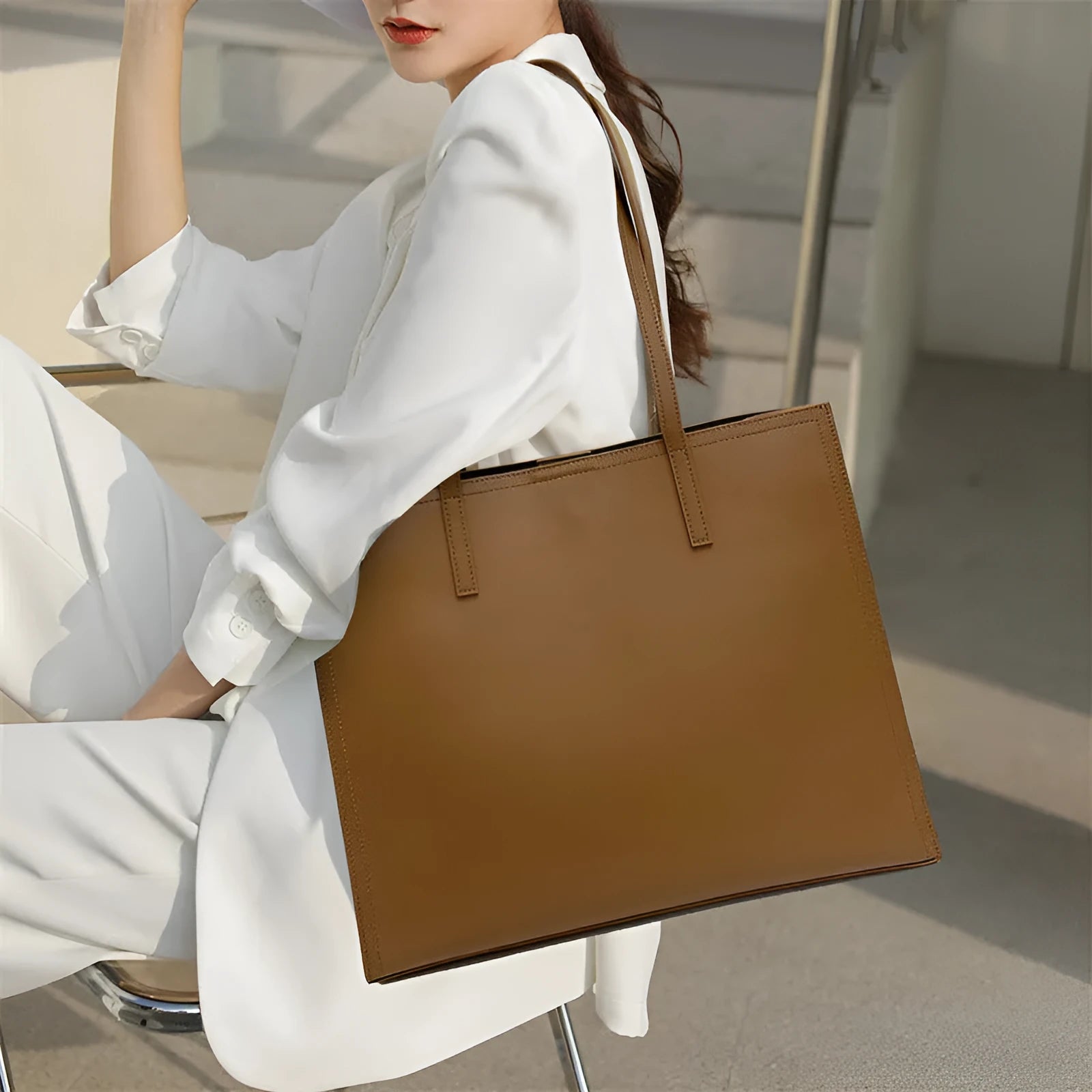 Women's brown genuine leather one shoulder handbag with multiple interior compartments