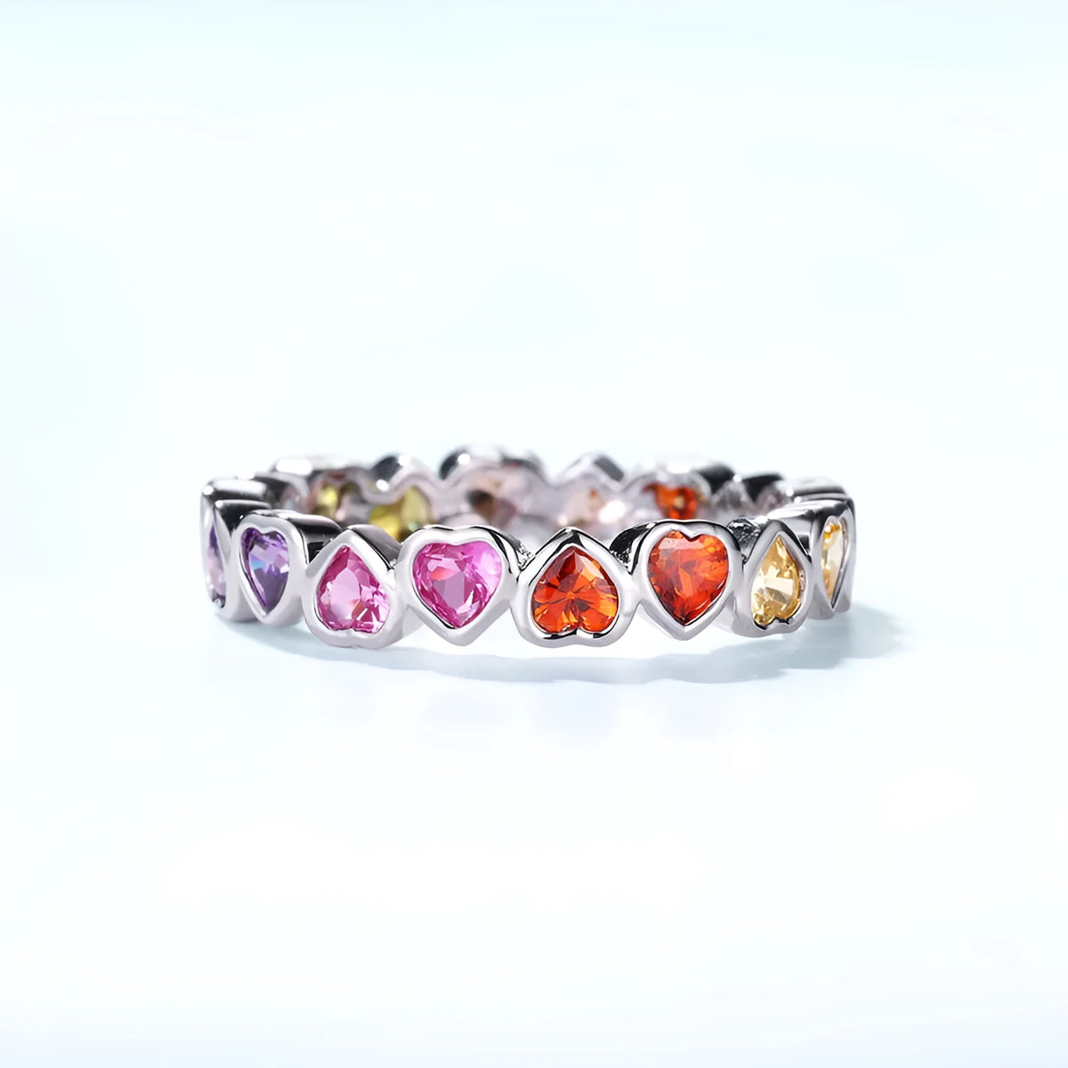 Silver love heart ring with coloured gems inlay and thick silver platinum finish, shown in US6 US7 US8 sizes