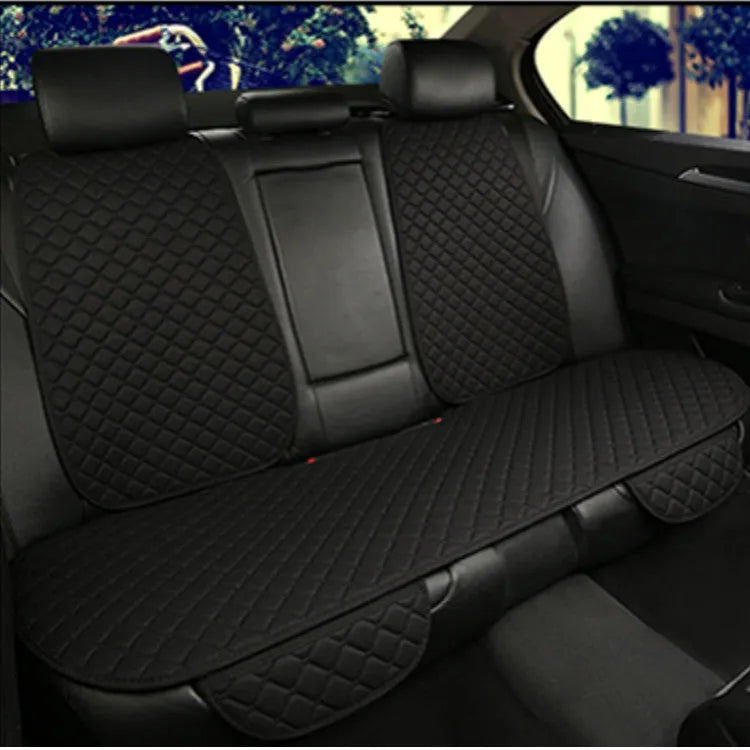 Linen car seat cushion with memory foam in Warm Cream colour on a car seat.