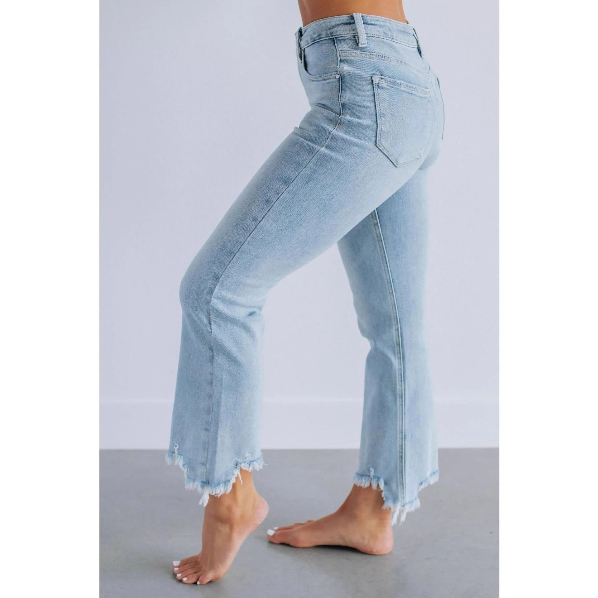 Women's solid colour denim pants with a hand-worn finish in dark blue and light blue.