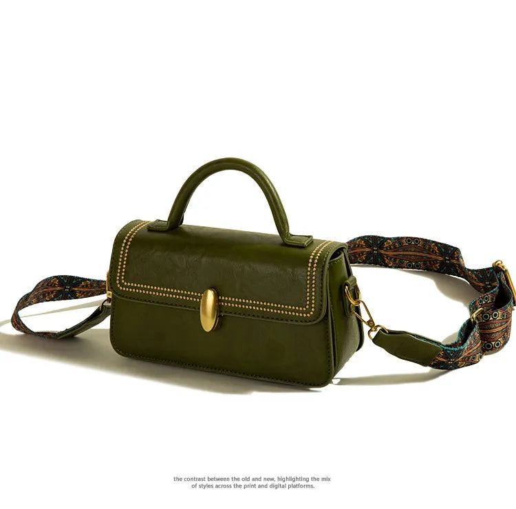 Brown retro-textured women's messenger bag with a shoulder strap, showing internal phone and file pockets.