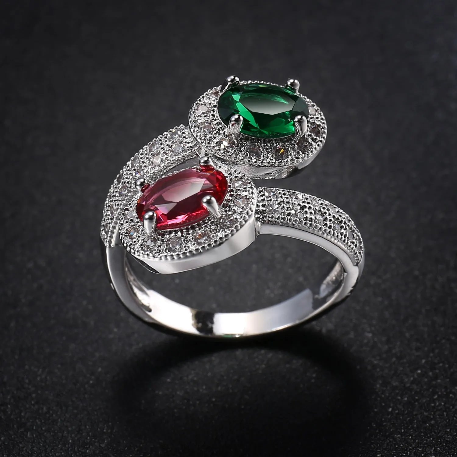 Fashion copper ring for women with zircon stones in rose jade colour, shown on hand