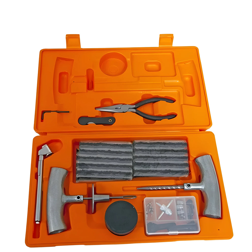 Open case showing emergency car tyre repair tool set with pressure gauge, pliers, and insertion tools.