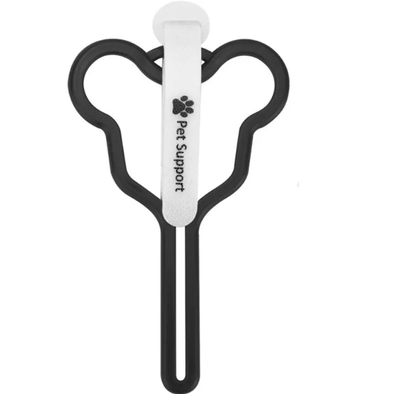 Dog poop bag holder with clip and velcro strap for leash attachment.