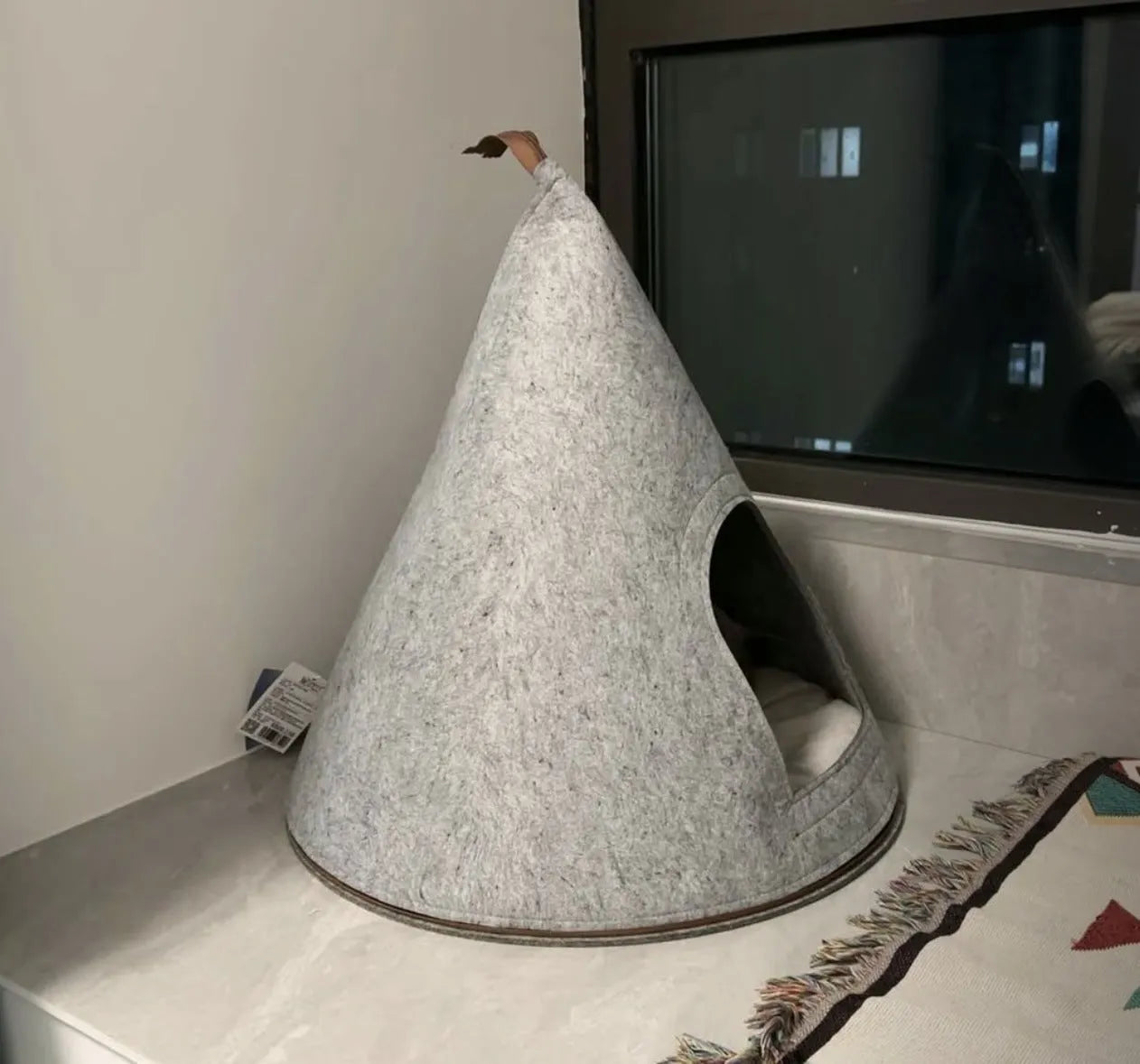 Grey handmade felt cone cat house with enclosed tent design for indoor cats