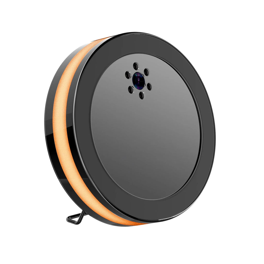 Black wireless smart surveillance camera with night vision and voice conversation on a desk