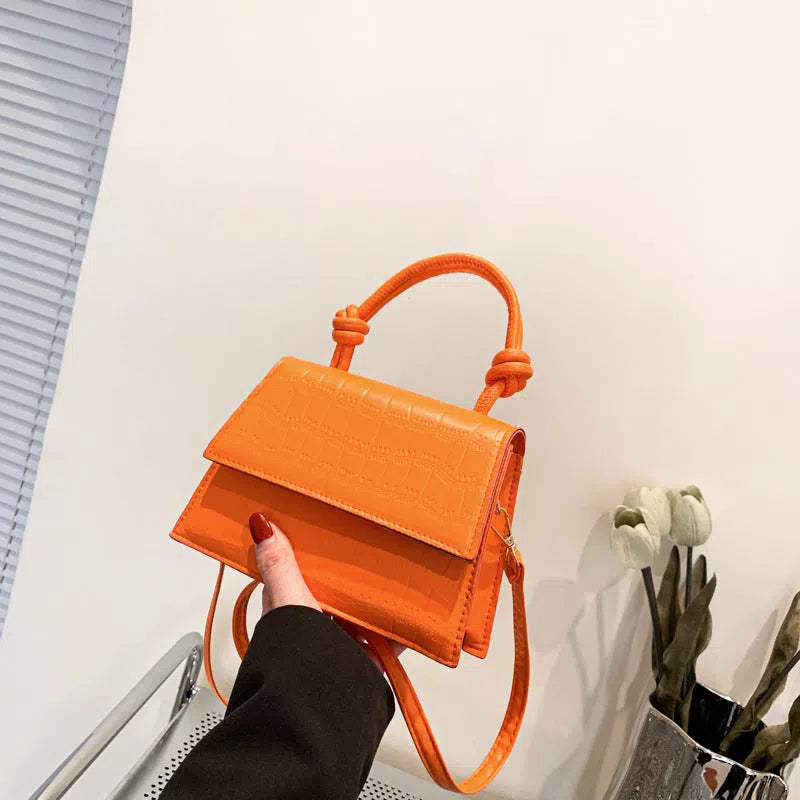 Urban minimalist PU leather commuter underarm bag for women in horizontal rectangle shape with stitched seams