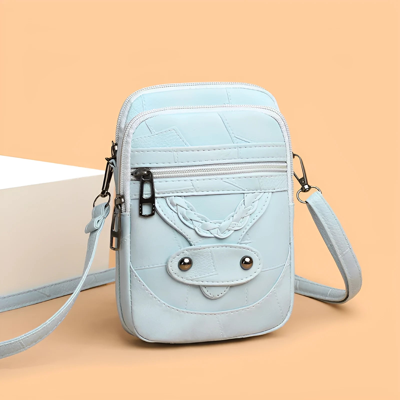 Retro style mobile phone bag in soft PU leather with weaving patterns and rivet detailing in four colour options