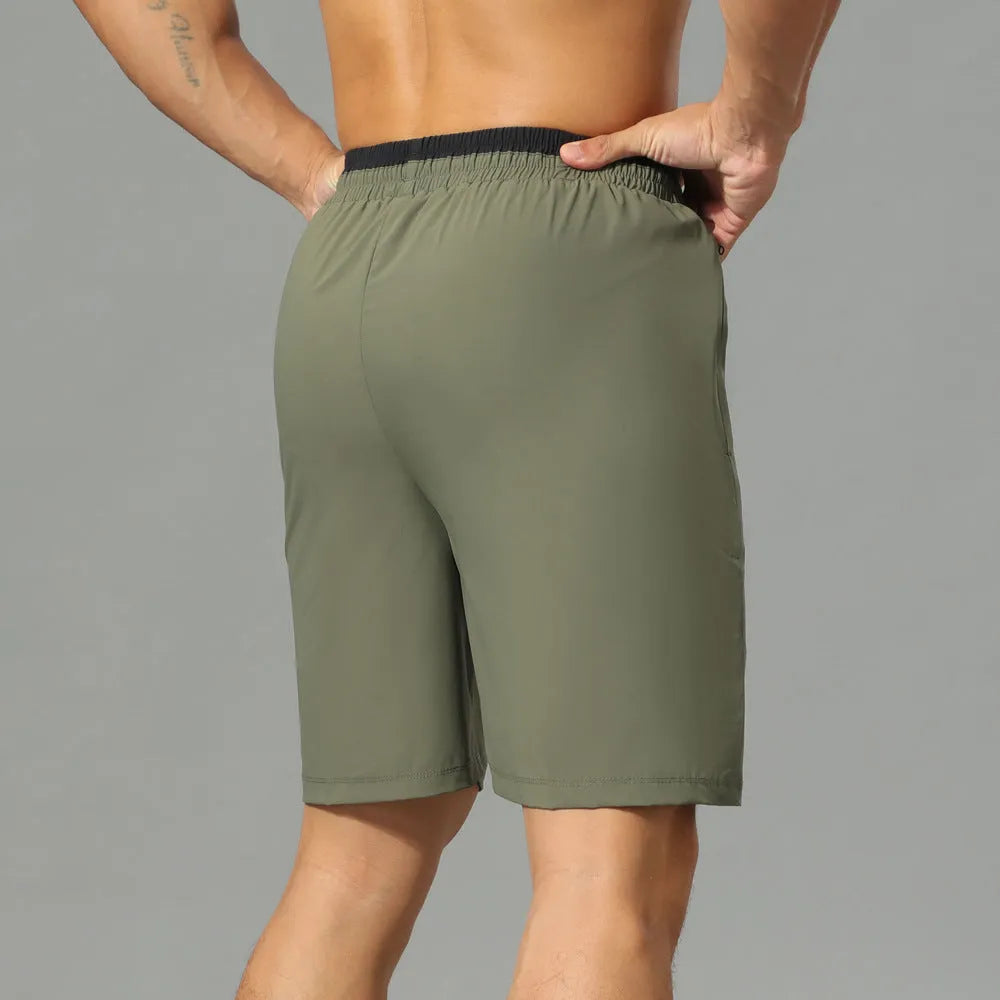 Men's grey ice silk quick-dry loose fit cropped workout pants on hanger