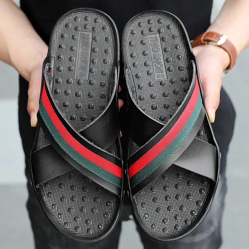 Men's cowhide leather flip-flops with PU sole in white, blue, or black on a beach background.