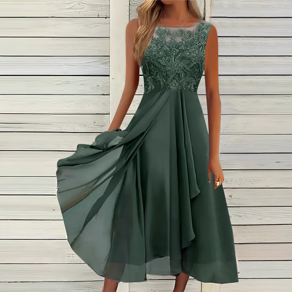 Women's sleeveless lace and chiffon dress in a princess style, shown in green colour.