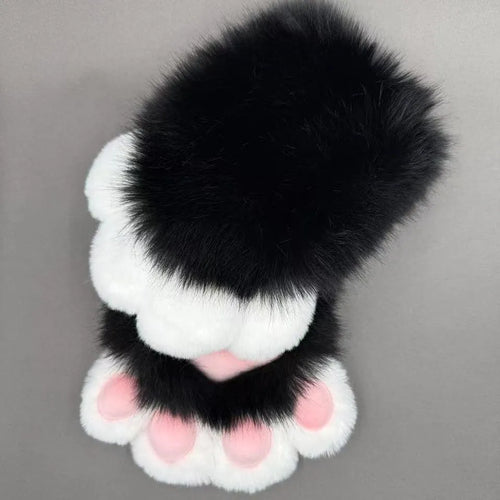 A pair of colourful animal claw cosplay gloves in nylon material on a neutral background.