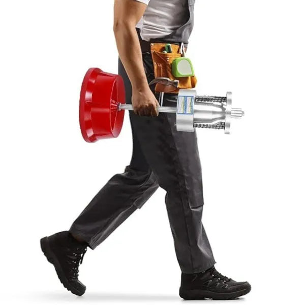 Portable aluminium hub balancer with bull's eye level on an enamel-finished base for tyre balancing.