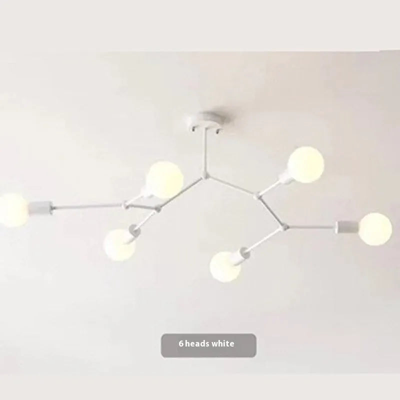 Minimalist black iron ceiling chandelier with six light heads in a Nordic style, against a white background.