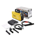 MMA-200MIN compact blue and black inverter welding machine with attached cables, face shield, and brush on a workbench.