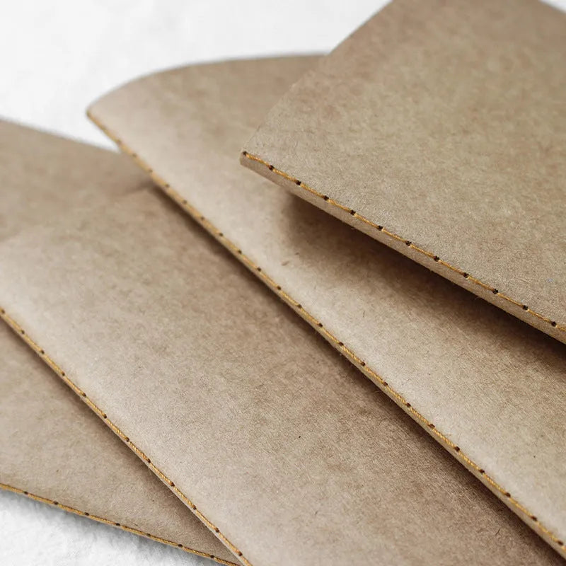 Cowhide diary refill insert showing dot grid and ruled pages with 11x21cm dimensions