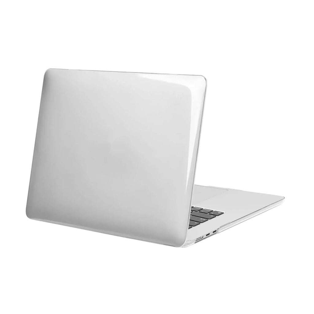 Clear hard plastic protective case for a MacBook laptop on a table.