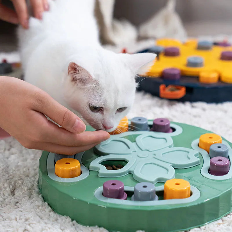 Interactive dog slow feeder puzzle toy in blue, green, and pink colour options.
