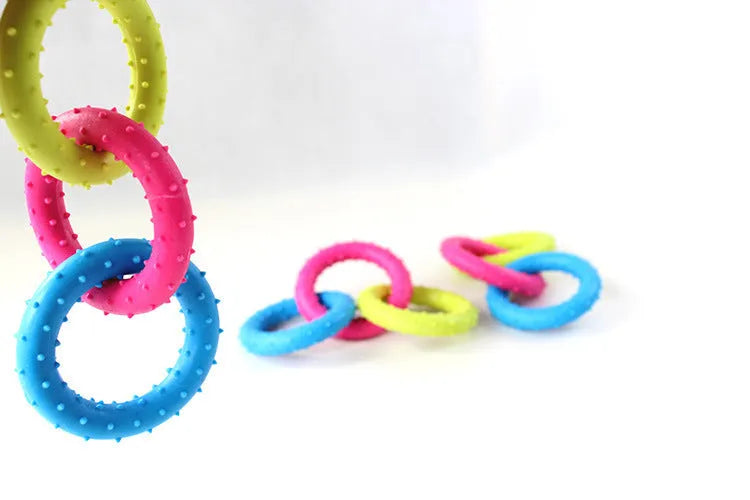 TPR plastic three-chain dog molar chew toy with raised cleaning nubs, shown in a random colour.