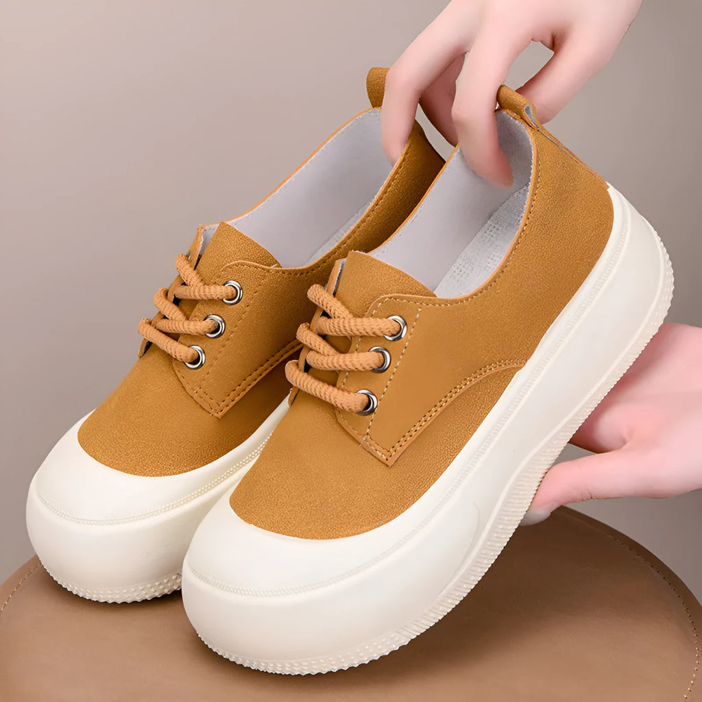 Women's camel suede platform loafers with a round toe, flat 4cm rubber sole, and front lace-up fastening.