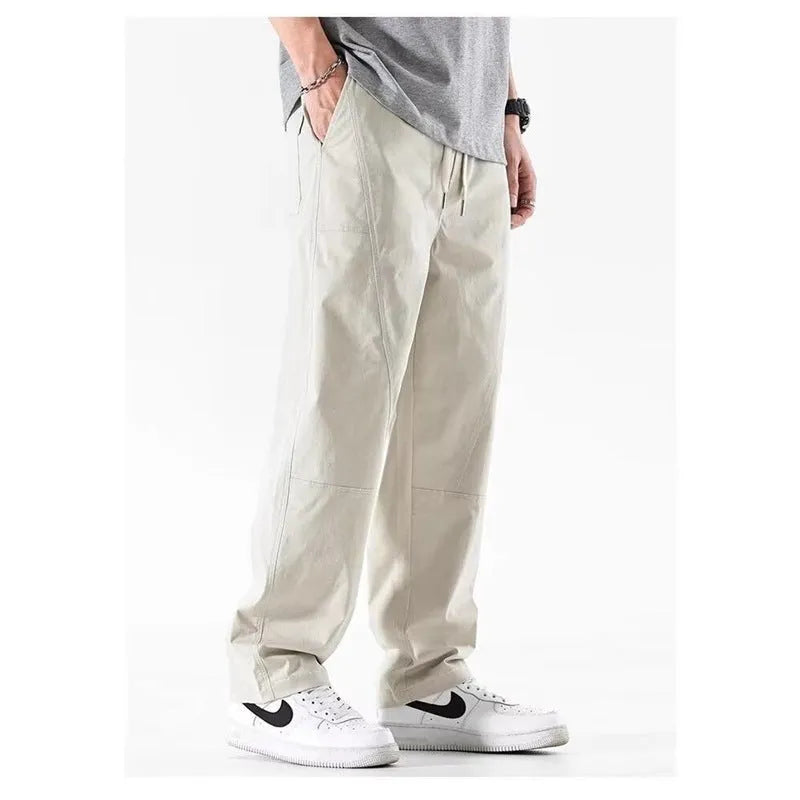 Cotton wide-leg casual trousers with elasticated waistband in black and milky white colours
