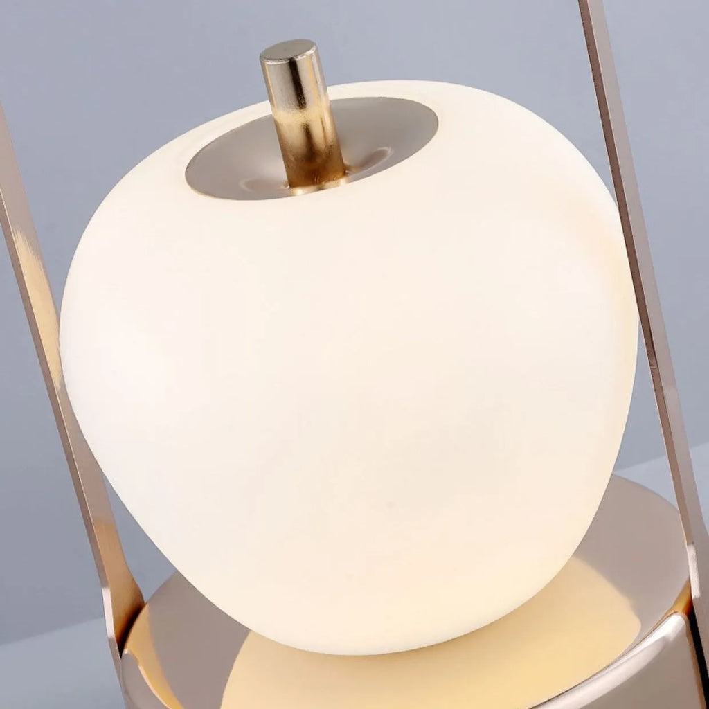 Rechargeable bedside table lamp with metal holder, golden, portable for camping and emergency use, USB charging