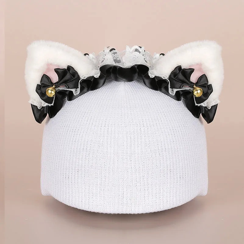 Soft plush cartoon character cover stretched over a pair of black on-ear headphones.