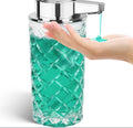Silver automatic sensor soap dispenser with type-c charging port on a bathroom counter.