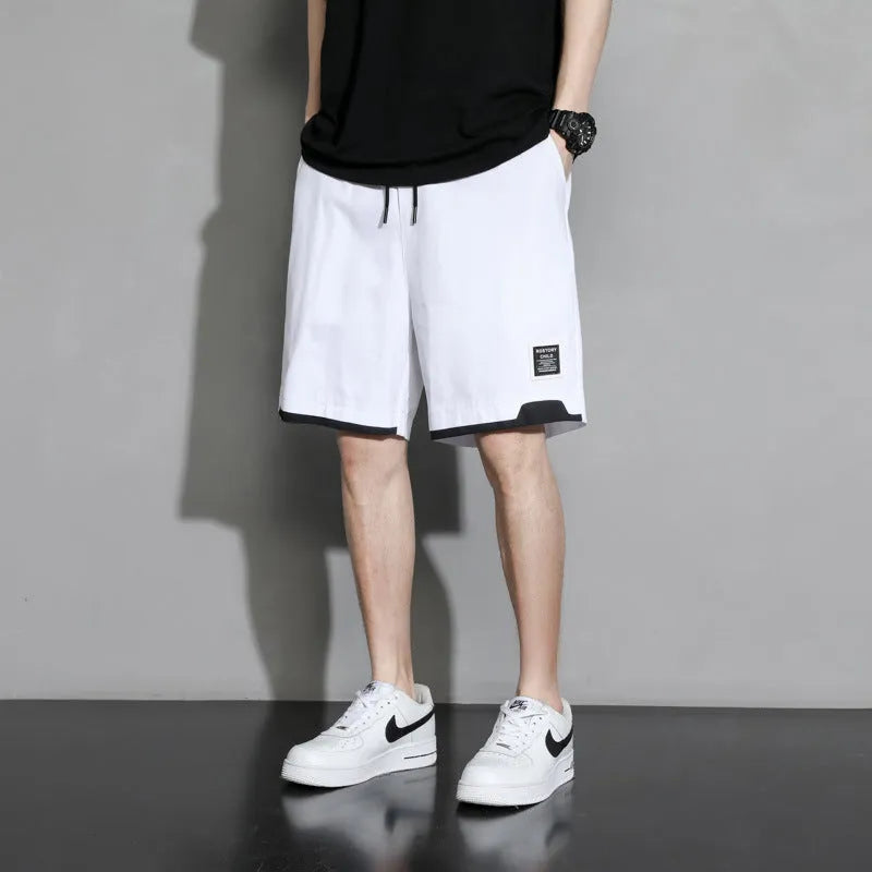 Cotton mid-waist shorts for boys in black, available in plus sizes from M to 8XL.