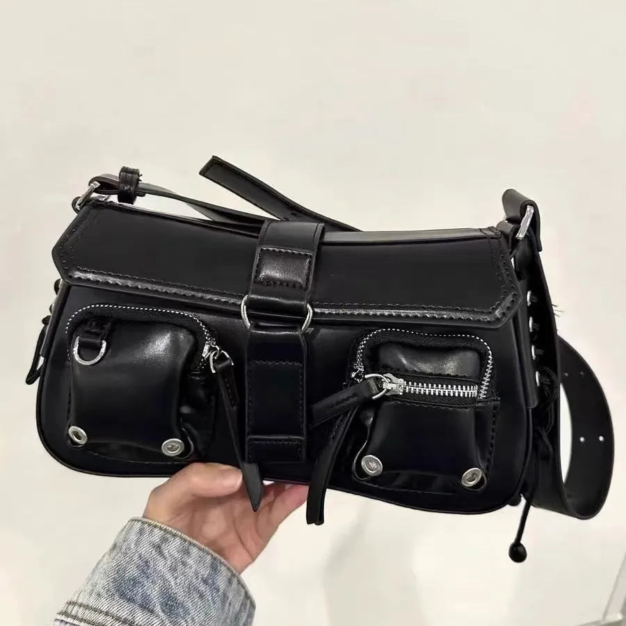 Black PU messenger bag with adjustable crossbody strap showing internal zipper change compartment