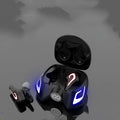 Black and grey wireless Bluetooth gaming earbuds with earplug-style design on a plain background.