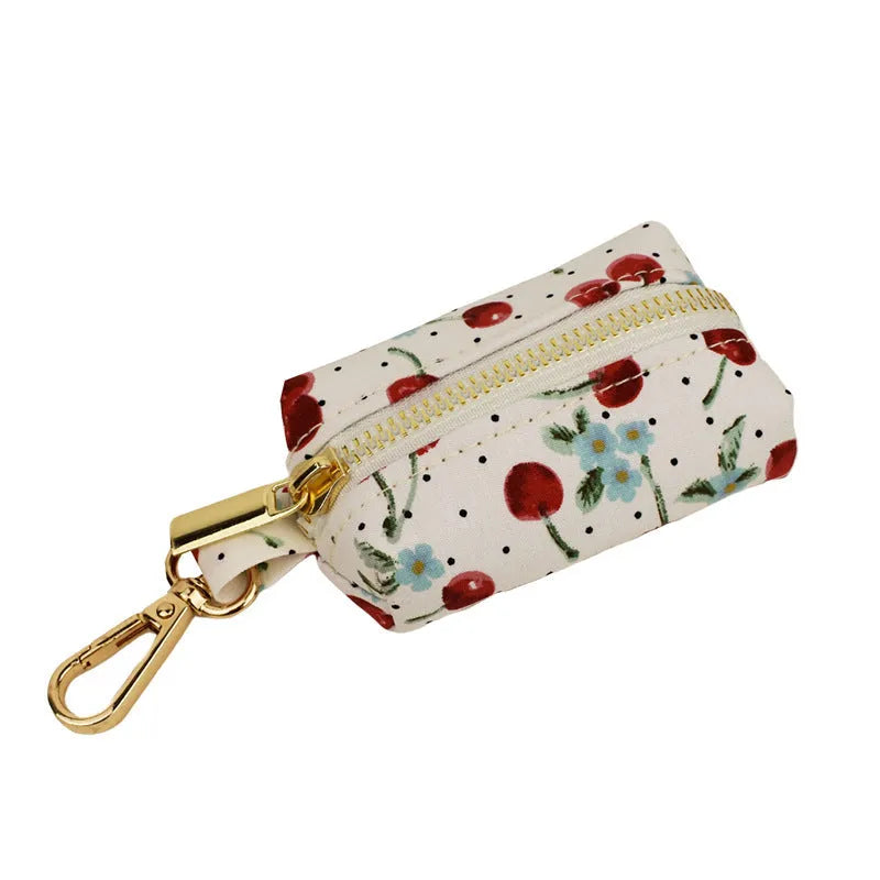 Red cherry print dog collar and leash set with light gold buckle and detachable bow strap