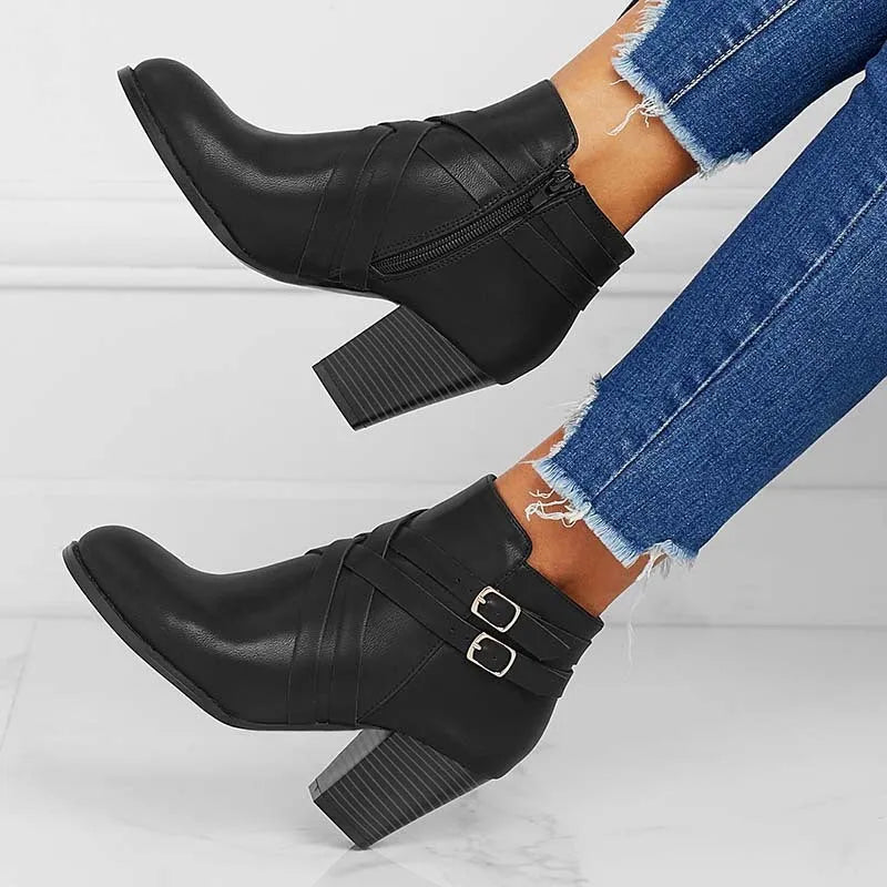 Women's black PU leather short boots with a side zipper and a 7cm thick chunky heel.