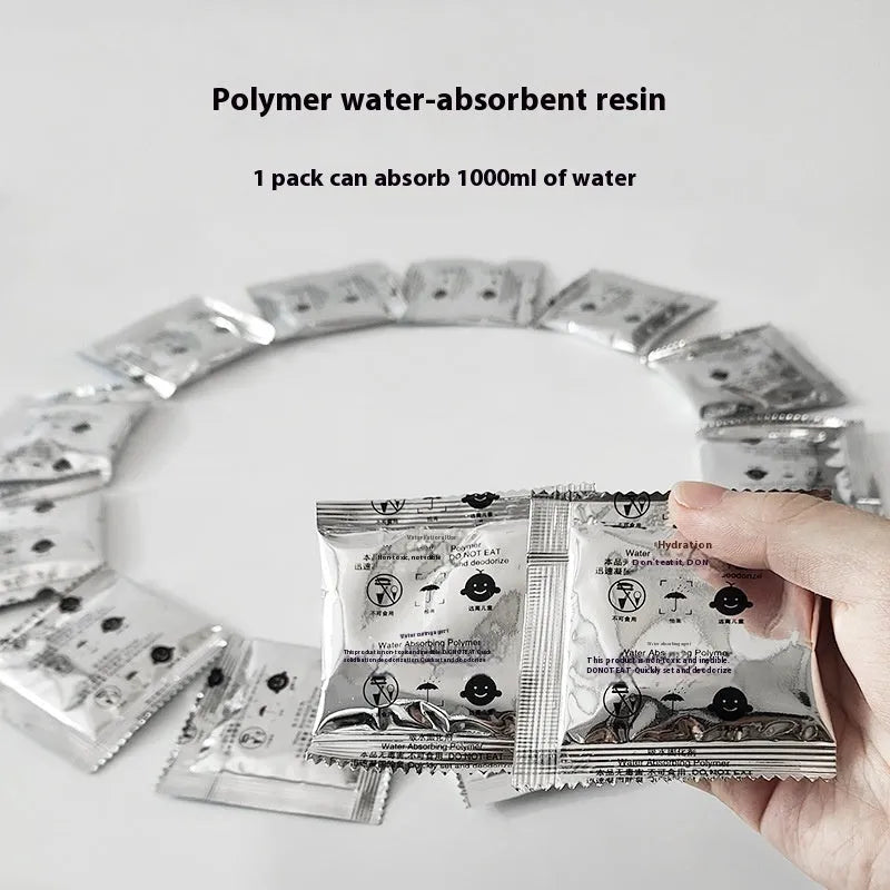 Emergency urine coagulant kit with curing agent packs and a roll of black disposable bags.