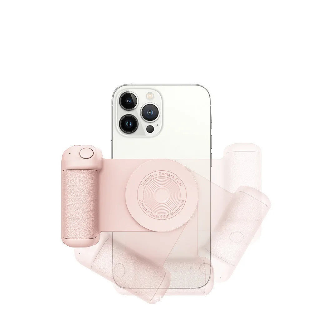 Black magnetic phone camera holder with rotatable bracket and ergonomic leather handle on a table.