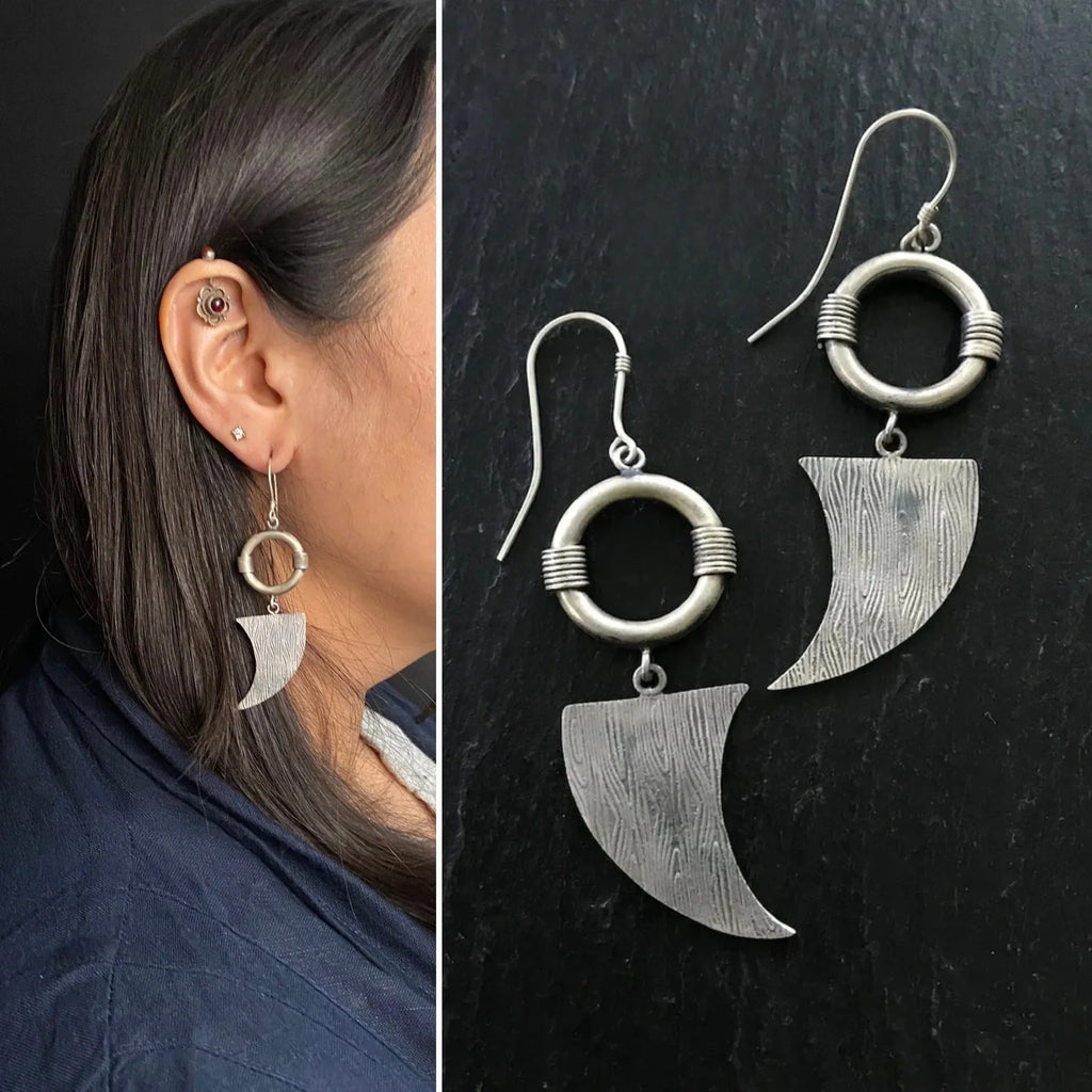 Retro women's earrings with antique silver snake design and electroplated finish on alloy.