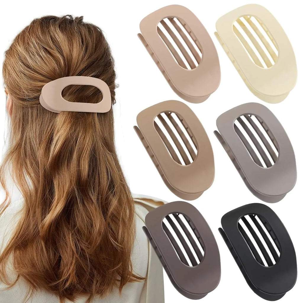 Six rose red plastic hair clips with quadrilateral design and frosted grip surface on white background