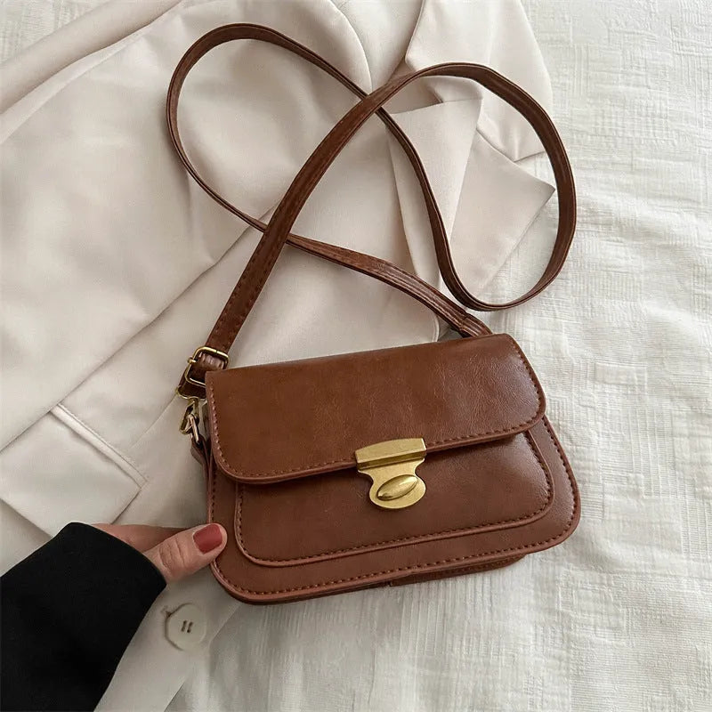 Soft PU leather horizontal square handbag in retro style showing four colour options